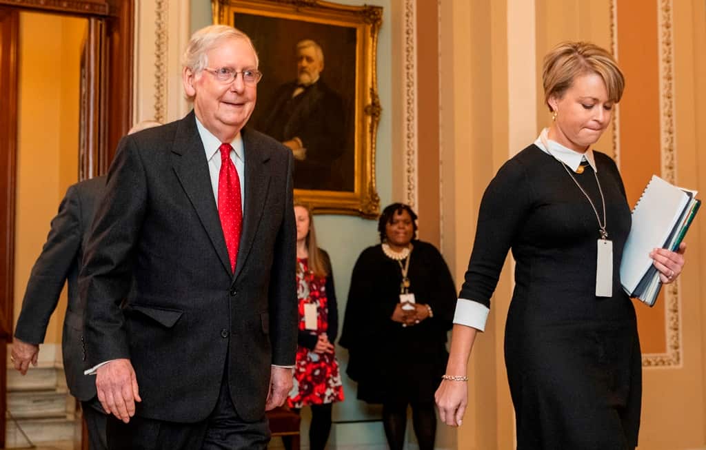 Senate Majority Leader Mitch McConnell walks from the Senate chamber as the impeachment trial of President Donald Trump concludes on Capitol Hill