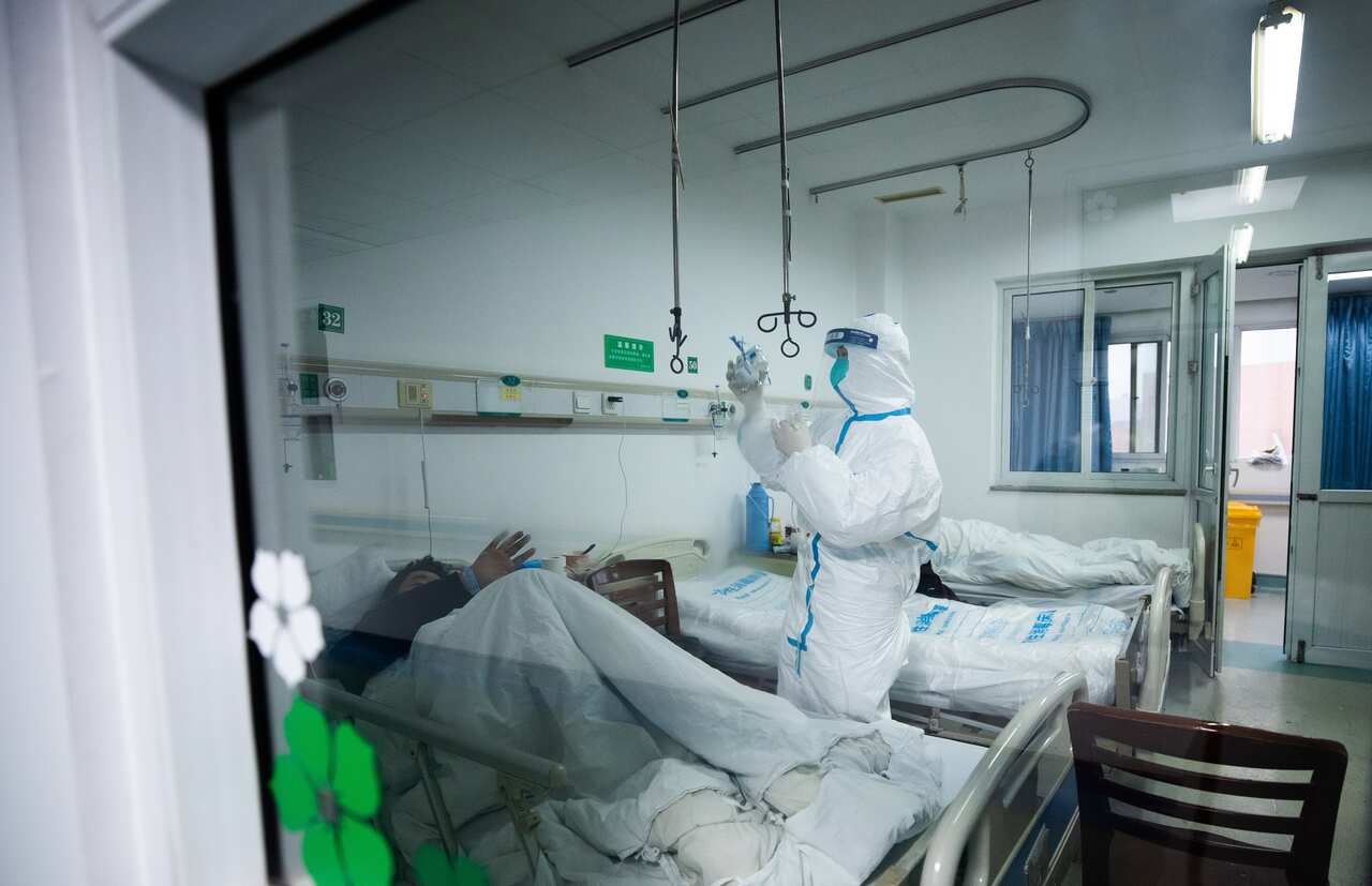 Medical staff work at Wuhan Jinyintan hospital, which specialises in the treatment of coronavirus.