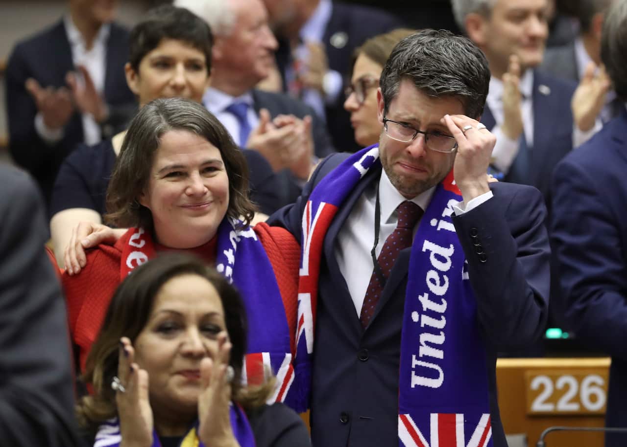Emotional members of the European Parliament during a plenary session on Brexit vote