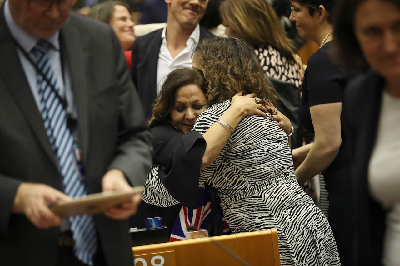 MEP's embrace after a vote on the UK's withdrawal from the EU