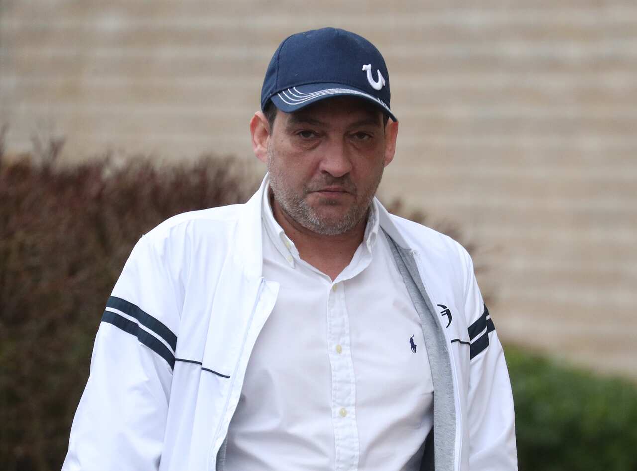 Mark Royden, 46, arrives at Salisbury Crown Court charged with attempting to steal the Magna Carta.