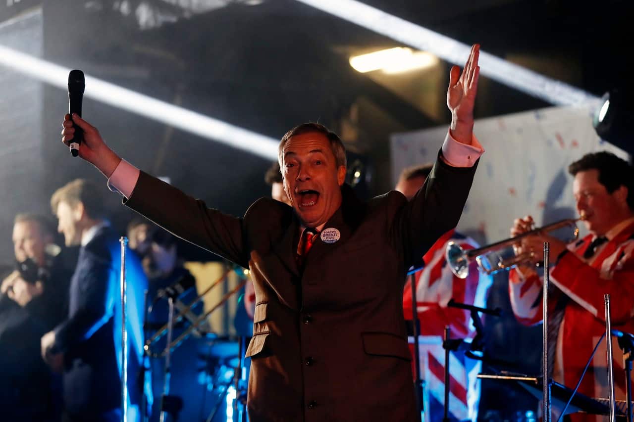 Brexit Party leader Nigel Farage celebrates during a rally in London.