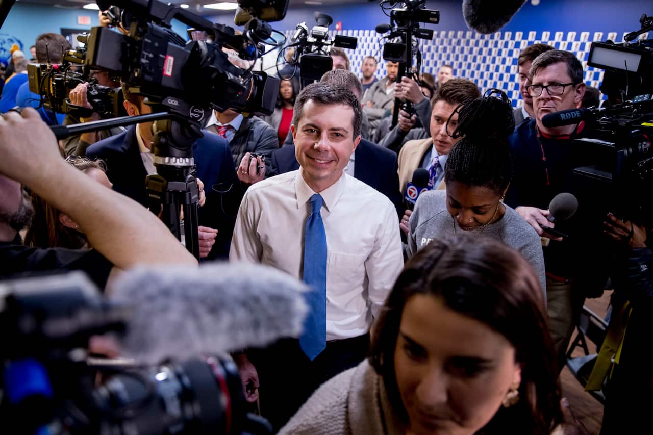 Democratic presidential candidate Pete Buttigieg visits a campaign office the day of the Iowa Caucus.
