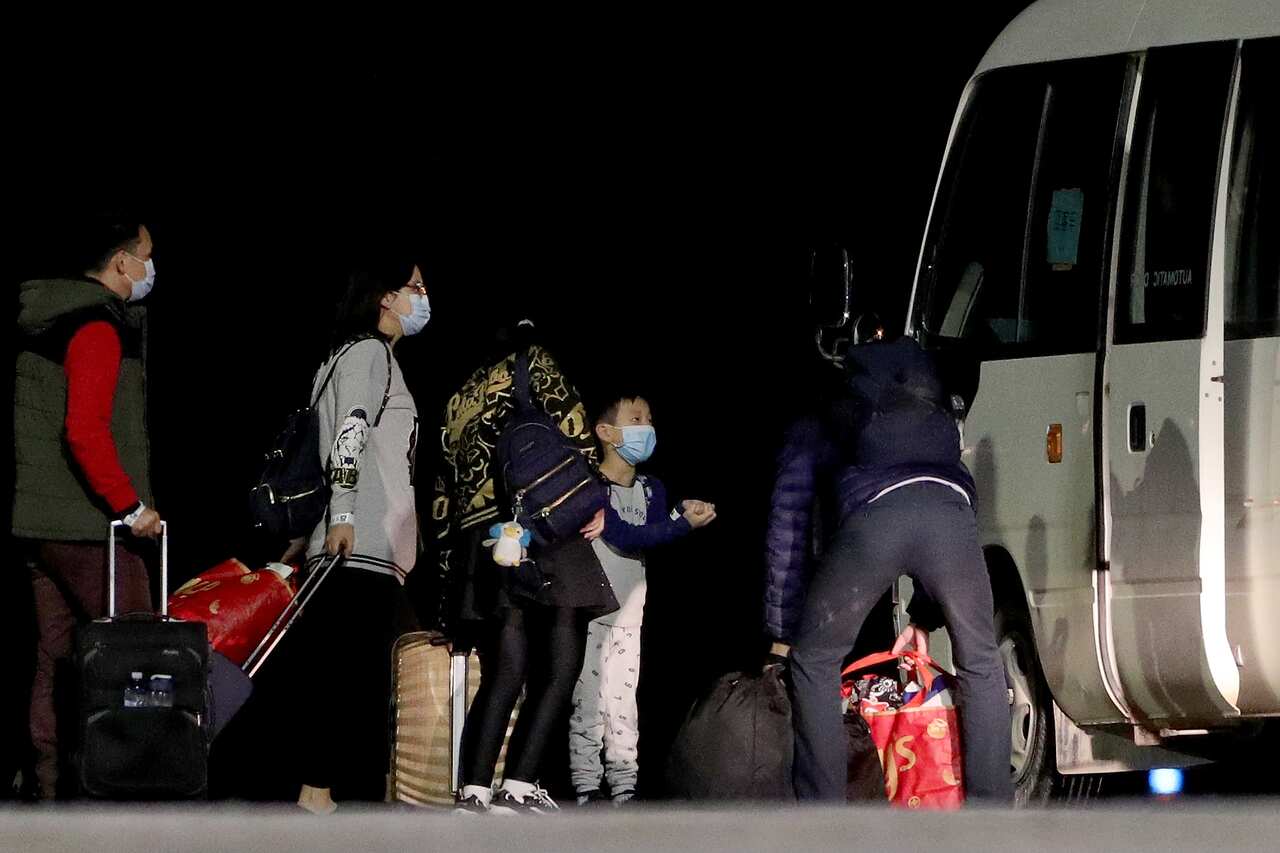 More Australians arrive on Christmas Island after being evacuated from the virus epicentre of Wuhan. 