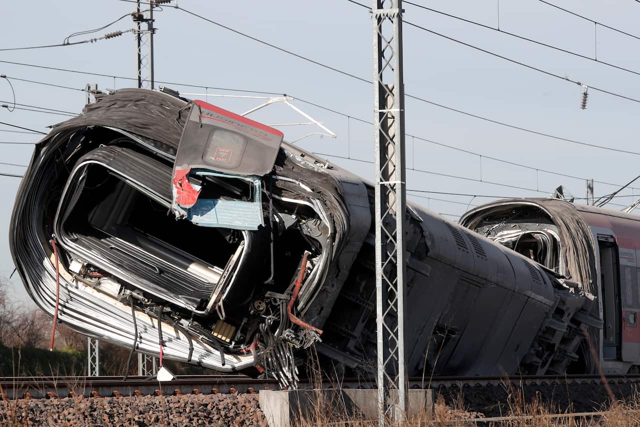 A carriage of the high-speed train was overturned after it derailed.