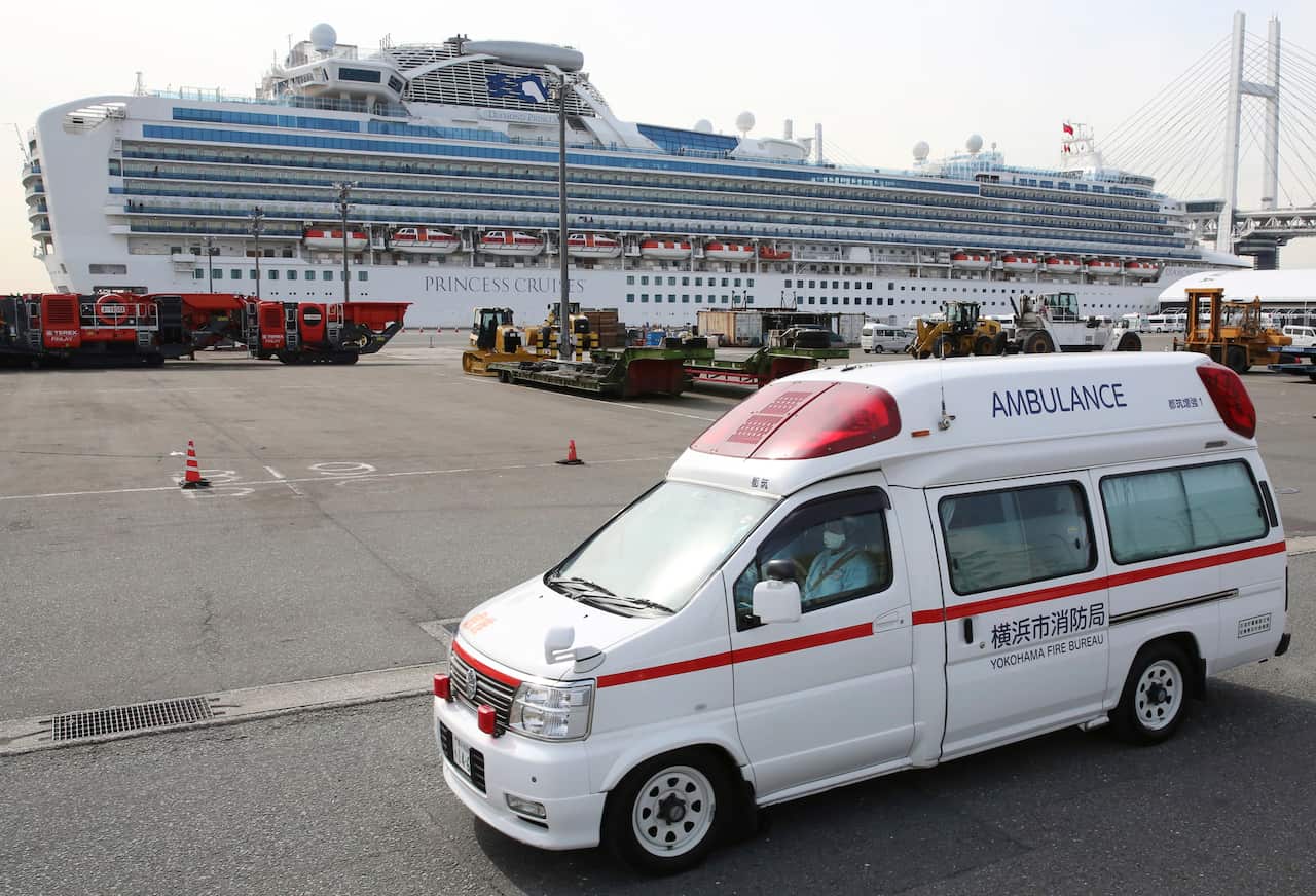 An ambulance is seen parked at the Yokohama port in Kanagawa Prefecture.