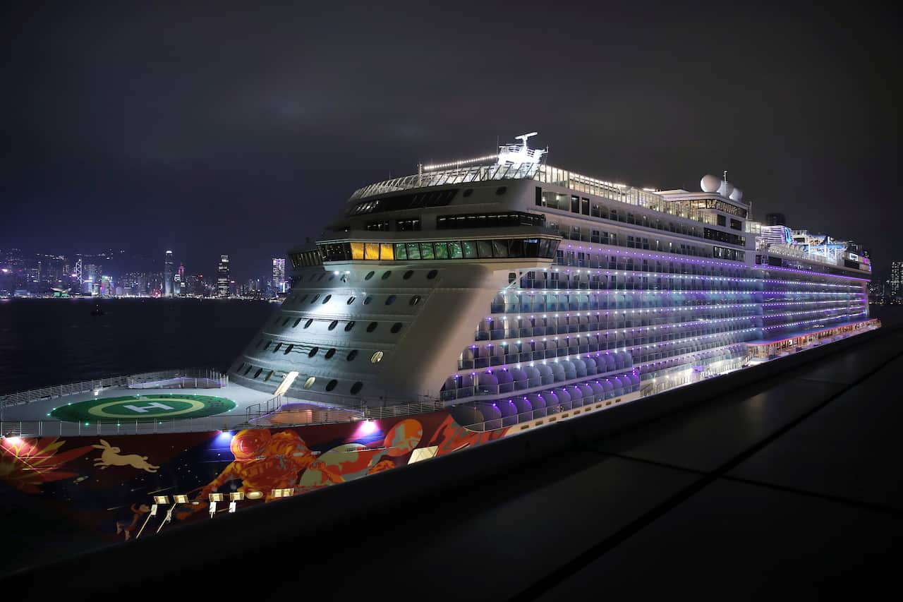 The cruise ship World Dream docked at Kai Tak cruise terminal as passengers leave the ship after being quarantined for the coronavirus in Hong Kong.