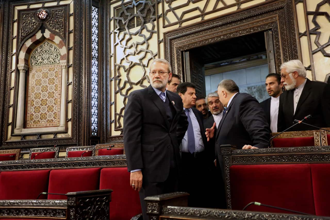 Iranian Parliament Speaker Ali Larijani visits Syrian parliament in Damascus.