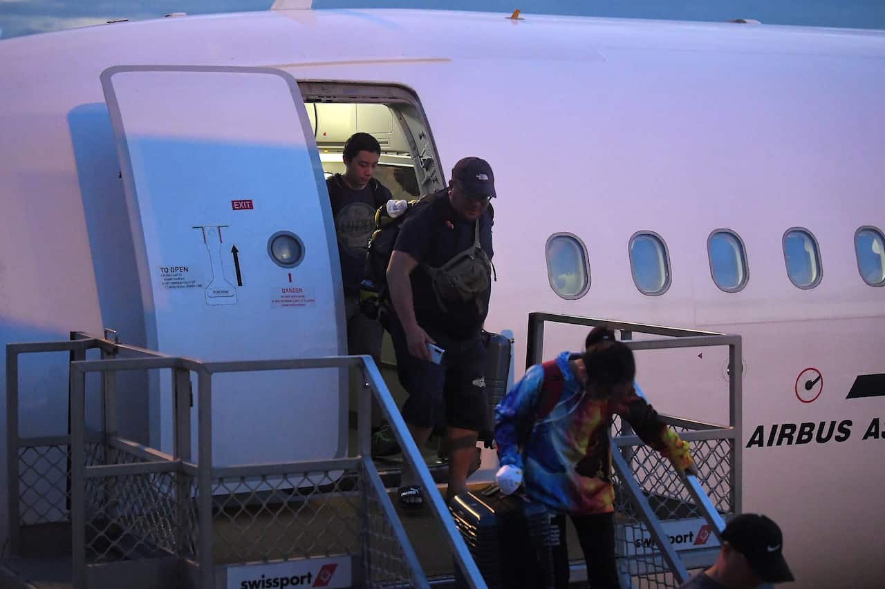 The bulk of the people quarantined on Christmas Island have been flown to the mainland on two aircraft while about 35 people will return the day after tomorrow.