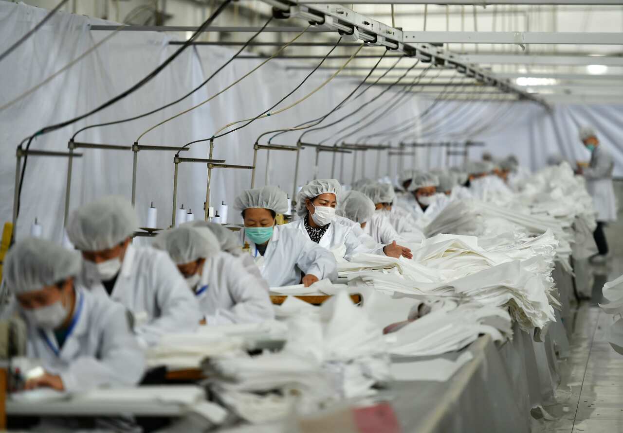 Workers produce 26000 protective clothing every day and sent them to Wuhan in 24 hours in Shijiazhuang, Hebei, China.