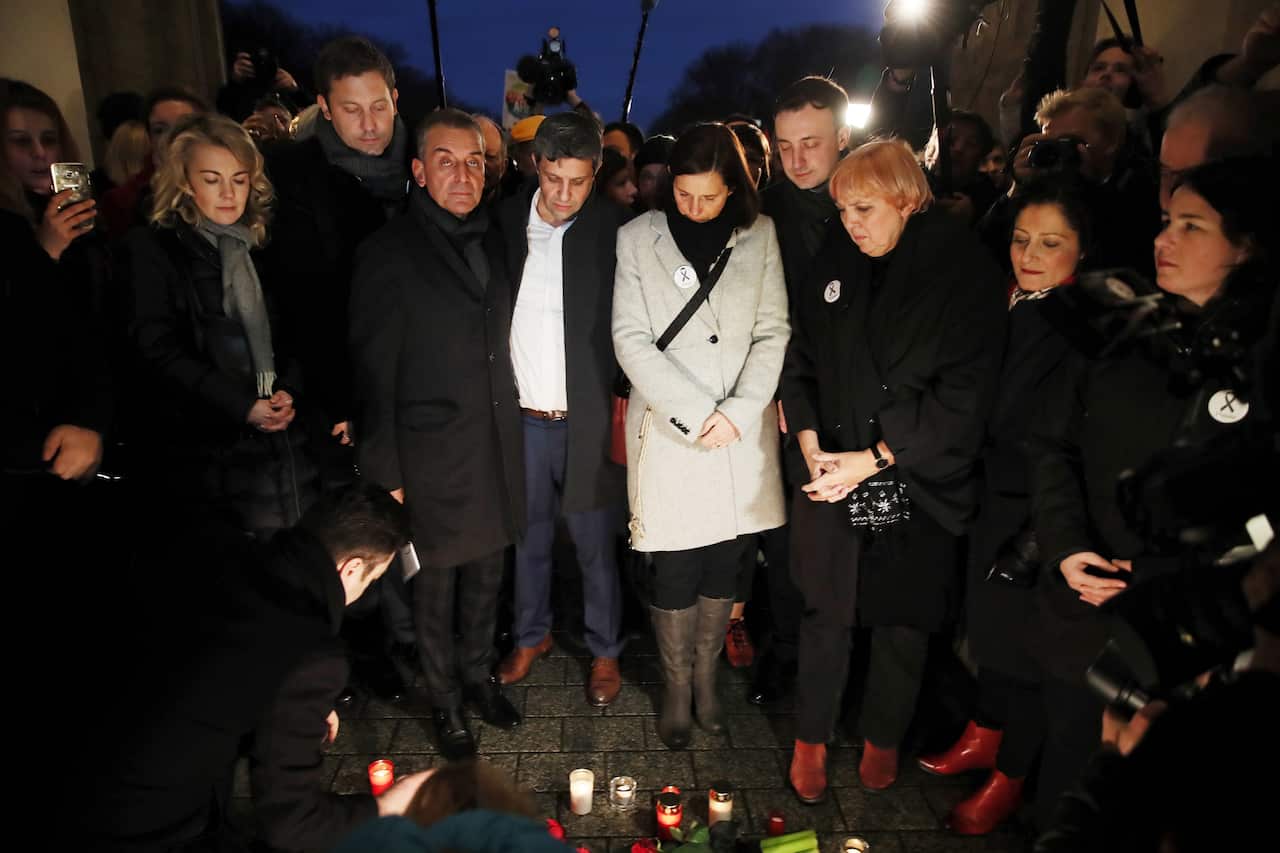German politicans attend a vigil after the Hanau terror attack at the Brandenburg Gate in Berlin.
