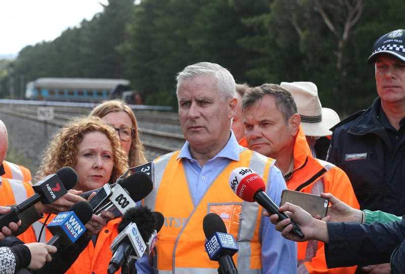 Deputy Prime Minister Michael McCormack speaks to the media during a press conference at the scene of an XPT train derailment in Wallan North