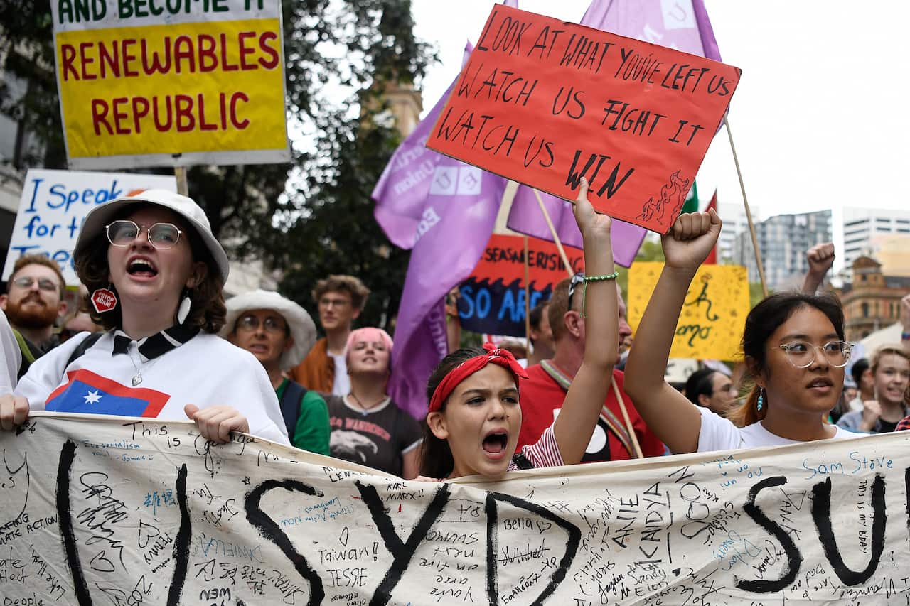 Teen activist Izzy Raj-Seppings (centre) is seen during the Climate Crisis National Day of Action rally in Sydney.