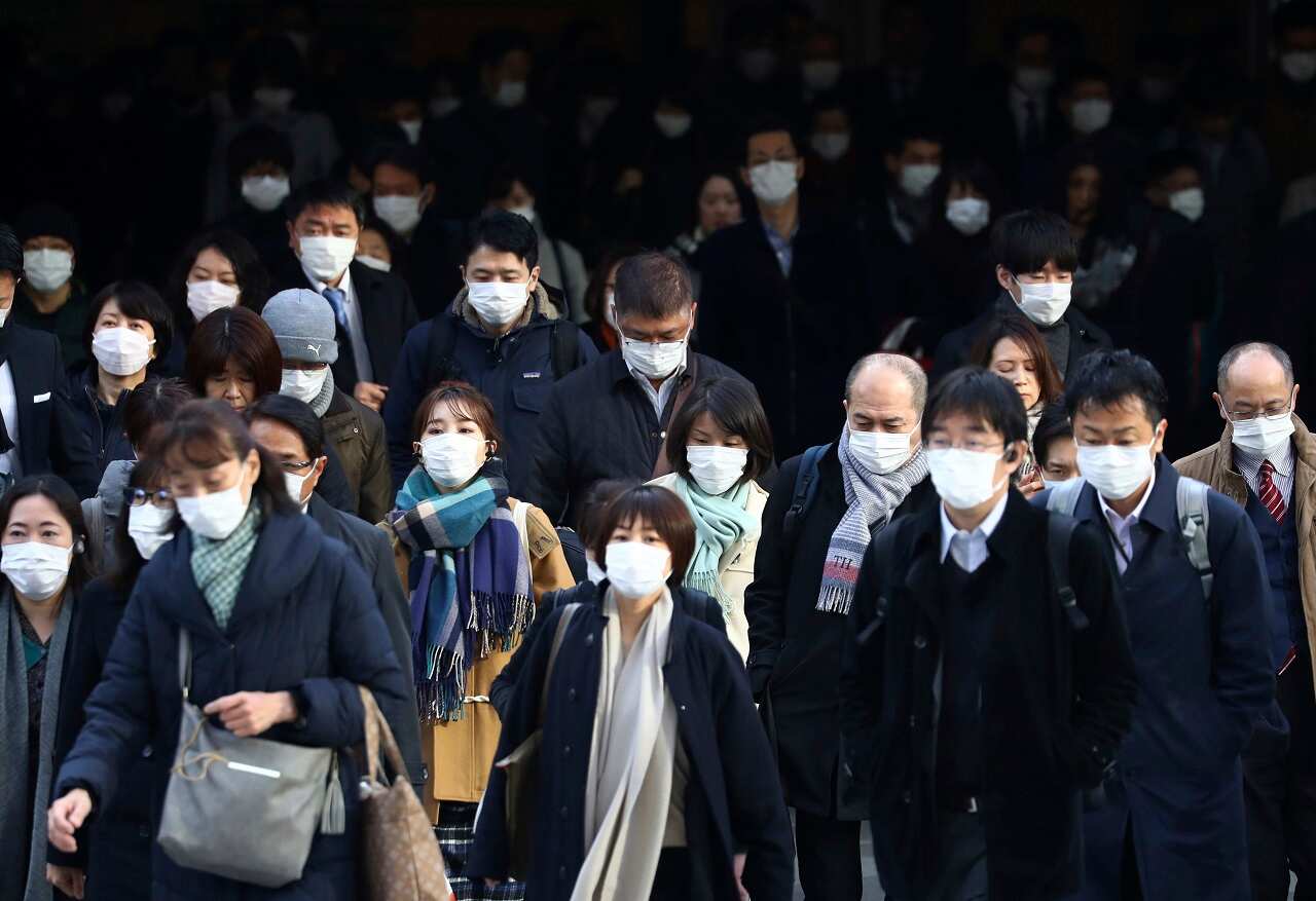 Commuters in Tokyo on Tuesday.