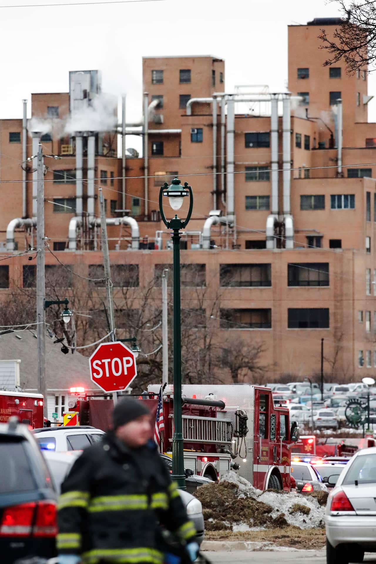 Milwaukee Fire Dept. personnel respond to reports of an active shooting at the Molson Coors Brewing Co. campus.