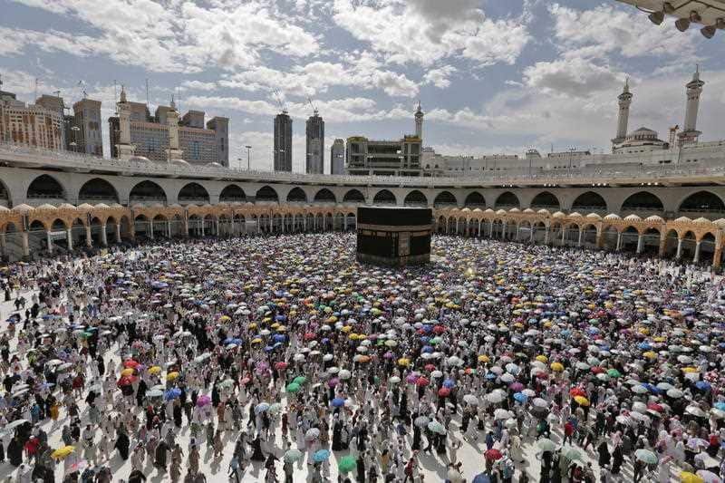 Muslim pilgrims circle around the Kaaba at the Masjidil Haram, Islam's holiest site during the Hajj pilgrimage in Mecca.