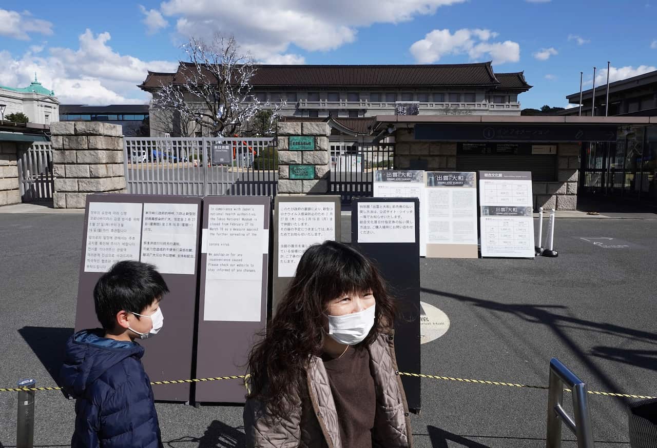 Visitors react after noticing the closure of the Special Exhibition at the Tokyo National Museum.