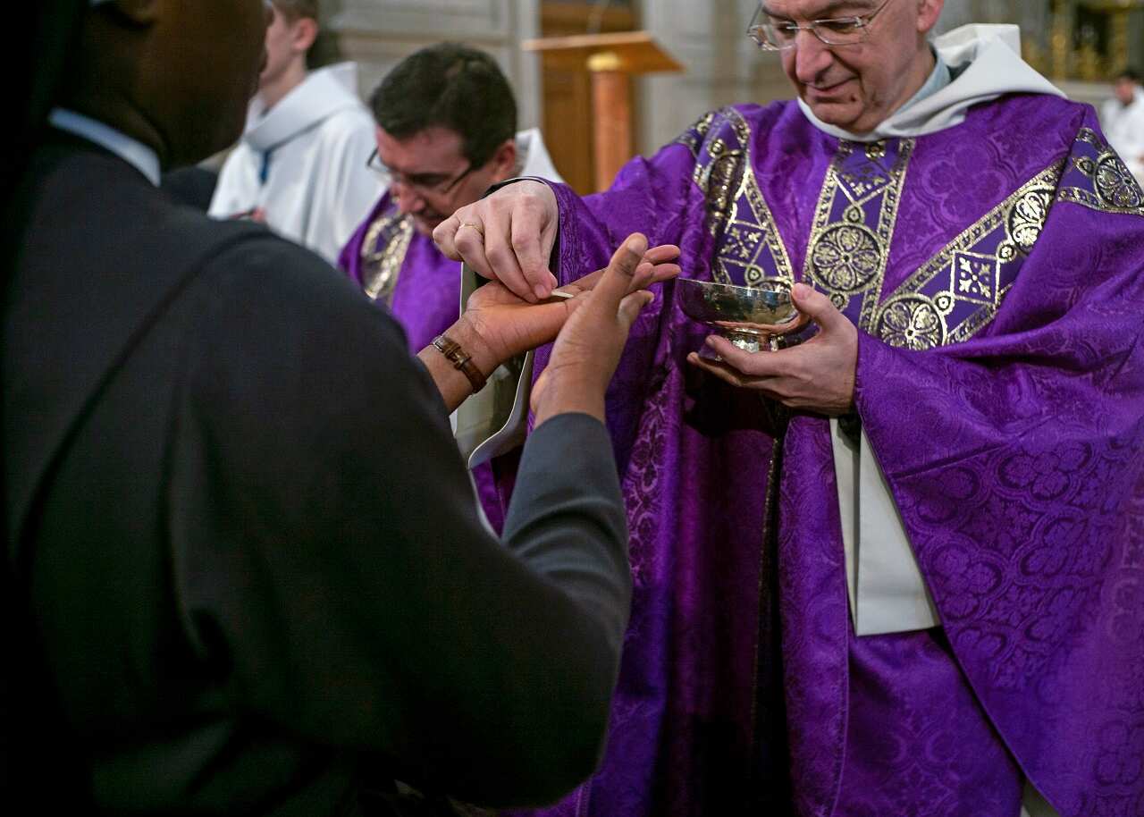 A mass celebrated at Saint Francois Xavier church in Paris.
