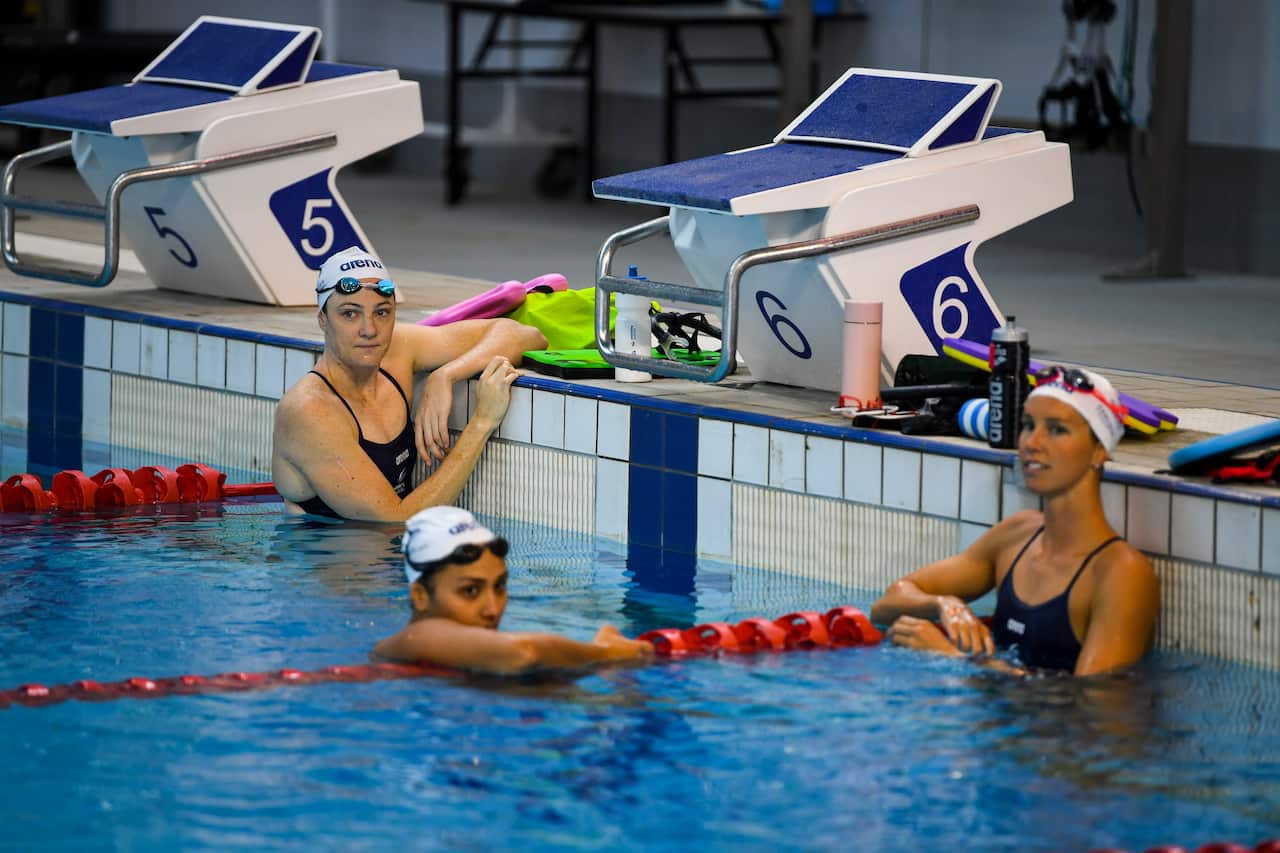 Former world swimming champion Cate Campbell rests during training ahead of Tokyo Olympic trials at the Australian Institute of Sport (AIS) in Canberra, Monday, March 2, 2020. (AAP Image/Lukas Coch) NO ARCHIVING, EDITORIAL USE ONLY