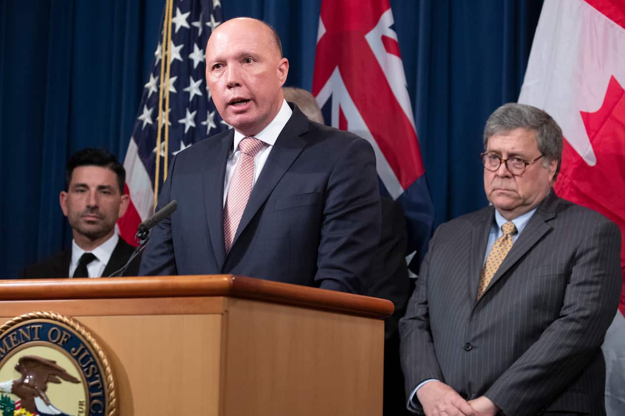 Minister for Home Affairs of Australia Peter Dutton speaks in Washington, before his COVID-19 diagnosis.