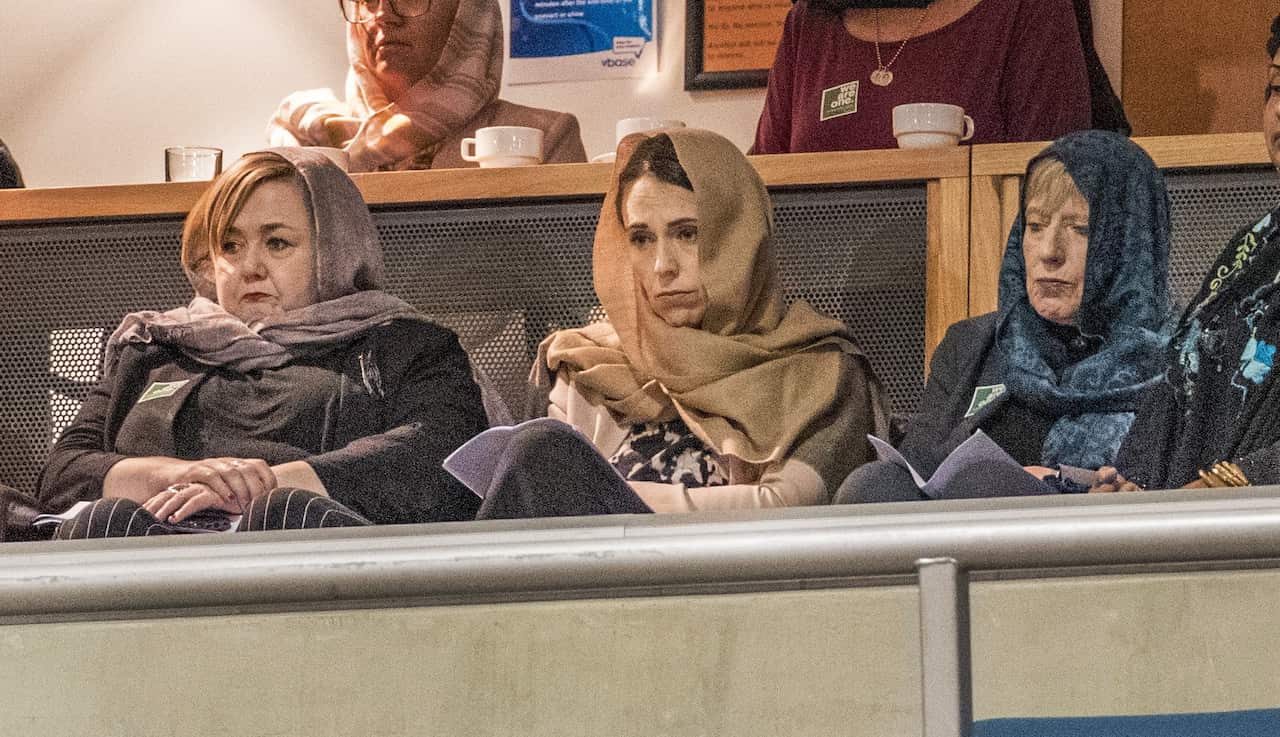 New Zealand Prime Minister Jacinda Ardern (C) attends Friday prayers at Horncastle Arena in Christchurch, New Zealand.