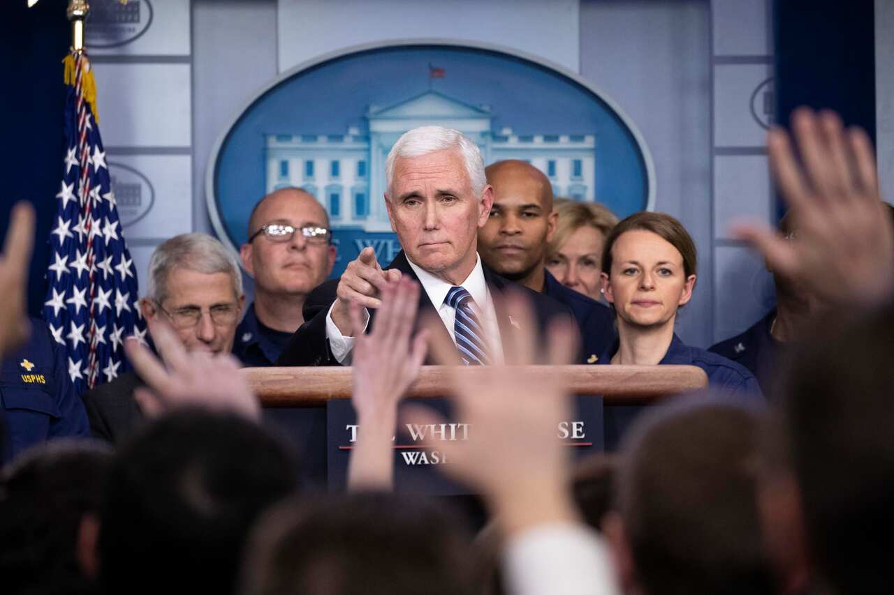 Vice President Mike Pence points to a question as he speaks during a briefing about the coronavirus in the James Brady Press Briefing Room of the White House.