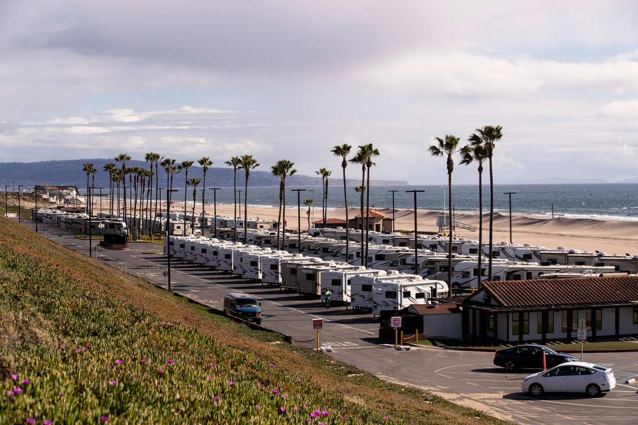 Los Angeles' homeless population could be self-isolating inside beachside motor vehicles.