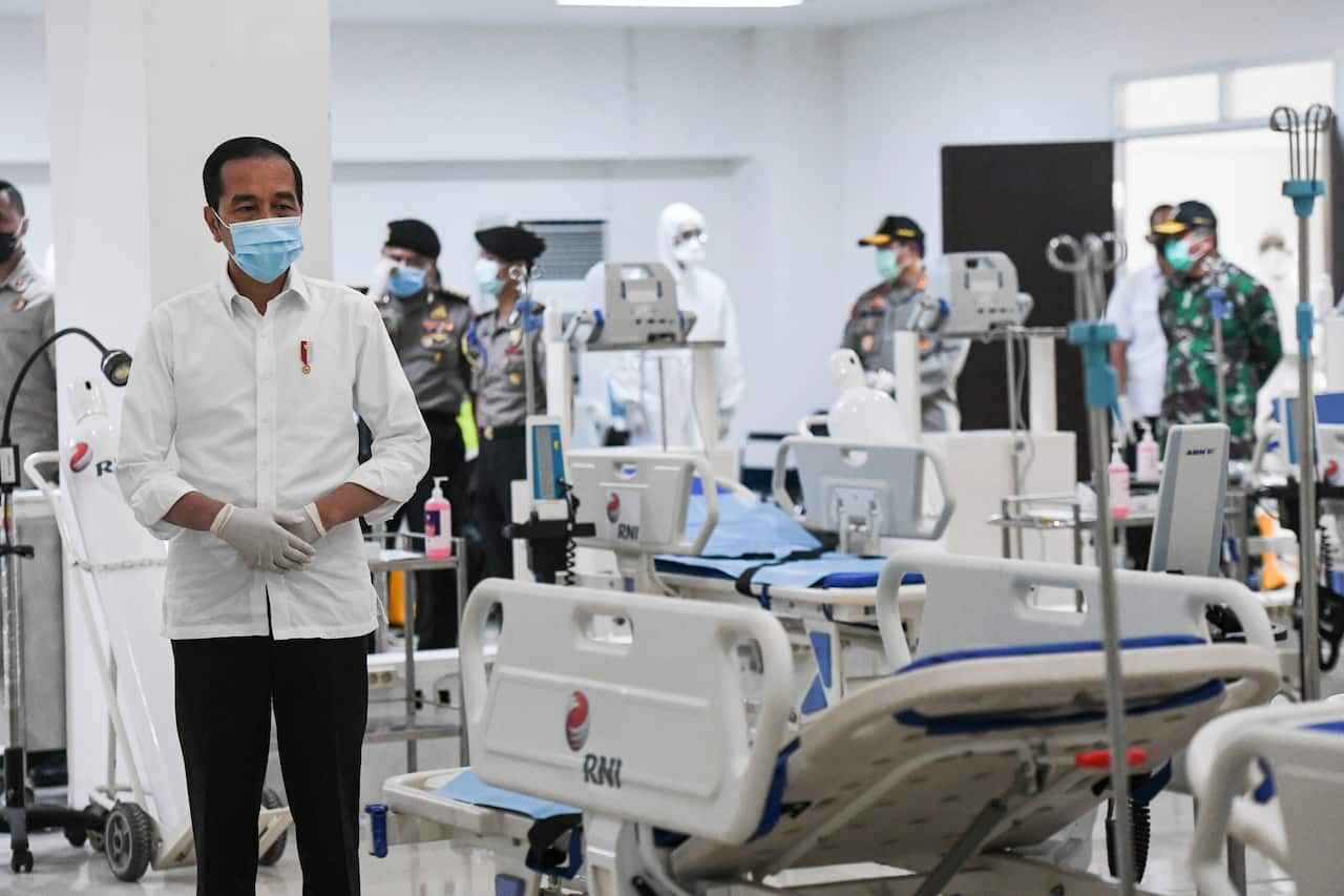 Indonesian President Joko Widodo inspects medical equipments at an emergency hospital set up amid the new coronavirus outbreak in Jakarta.