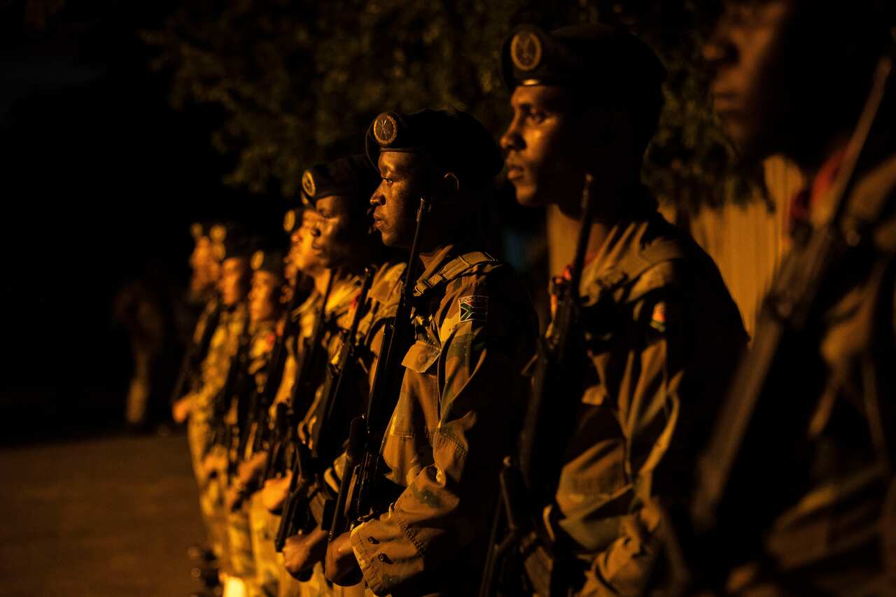 Members of the South African National Defense Force (SANDF) deploy hours before the announced 21-day COVID-19 lockdown in Johannesburg, South Africa,