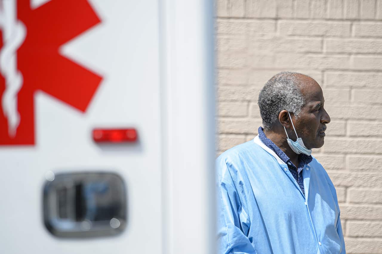 A healthcare worker taking  a break in New York, 7 April, 2020.