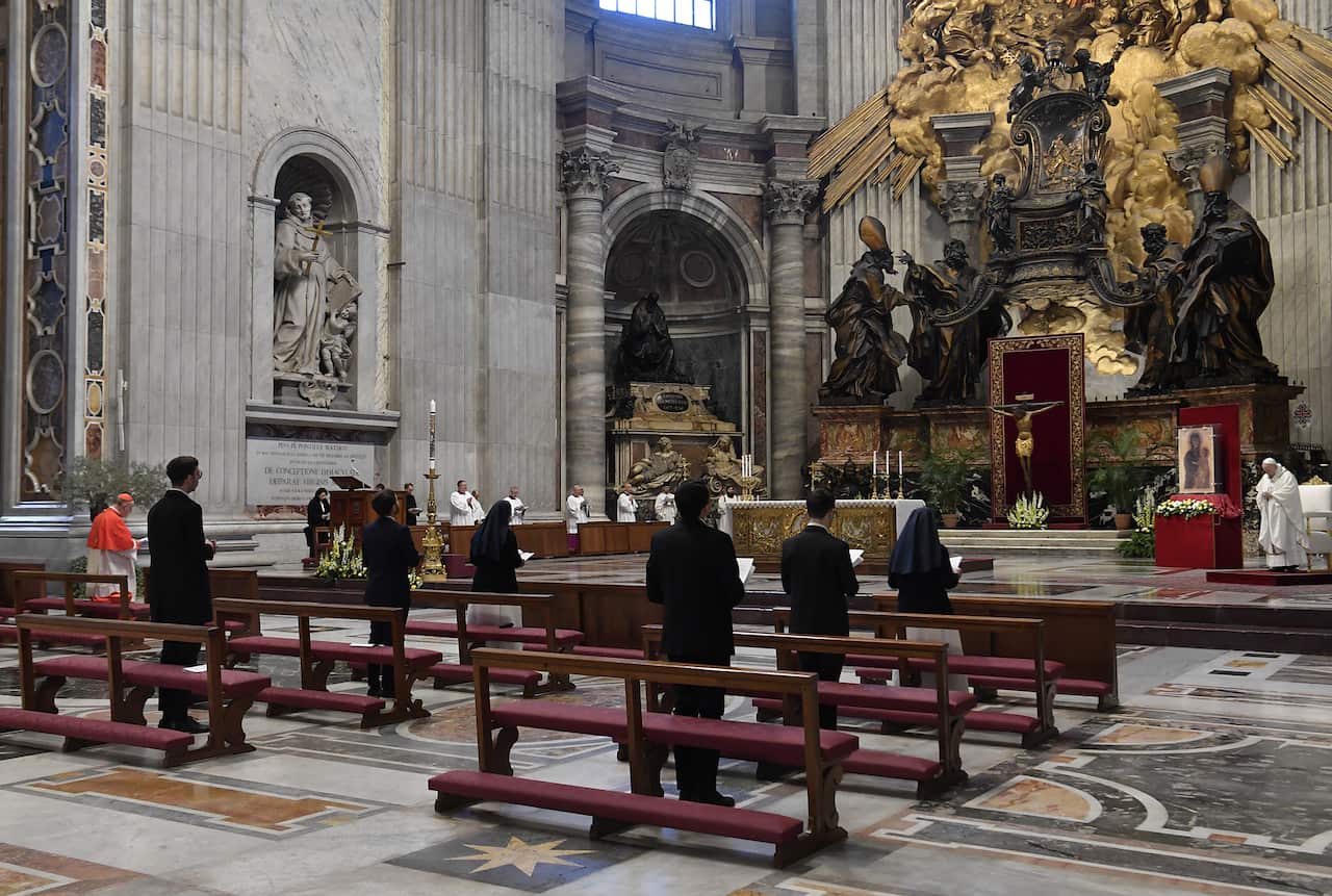 Pope Francis celebrates the Easter Mass on Holy Sunday behind closed doors in Saint Peters Basilica at the Vatican