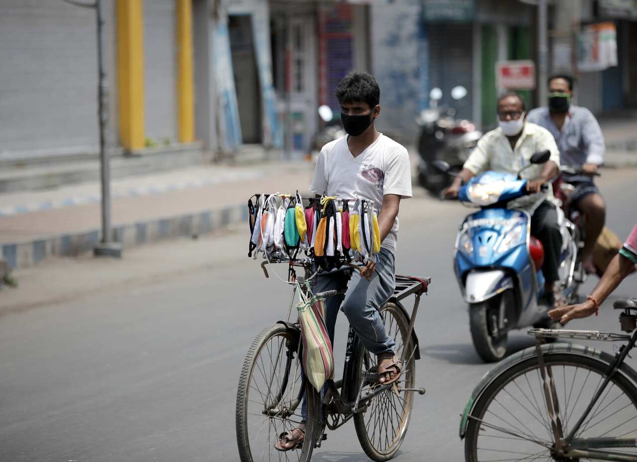 A man sells face masks during the lockdown in Kolkata, India.