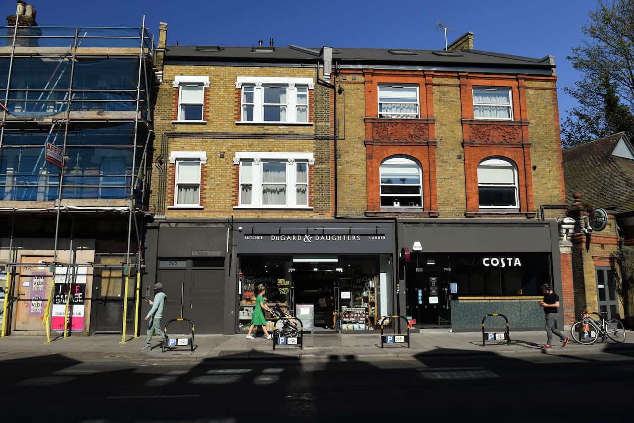 People walk in South London, UK.