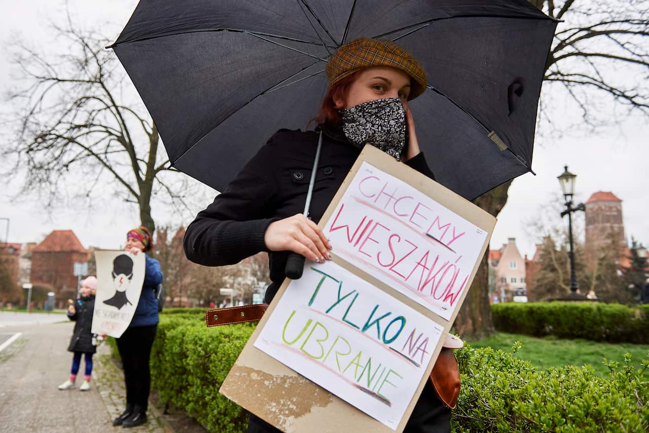 Activists of the 'Women strike: we don't fold umbrellas' campaign take part in a protest against the tightening of abortion laws.