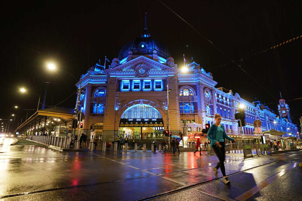The Flinders Street Station is lit up in blue colour in tribute to four police officers that died after being hit by a truck on Melbourne's Eastern Freeway.