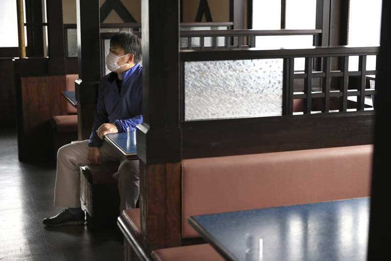 A man in a restaurant in Kamisu, Japan  on April 23, 2020.