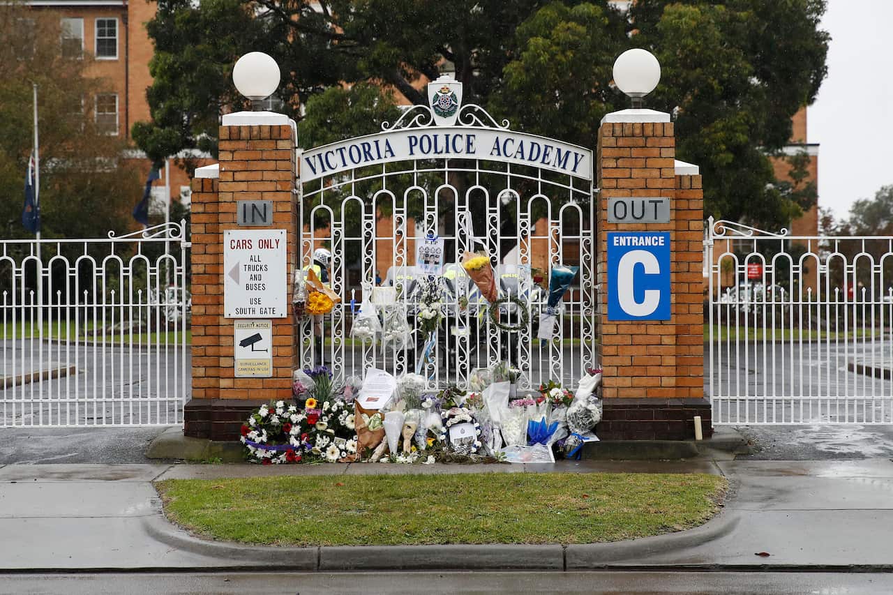 Tributes are seen at the funeral of Constable Glen Humphris at the Victoria Police Academy in Melbourne.