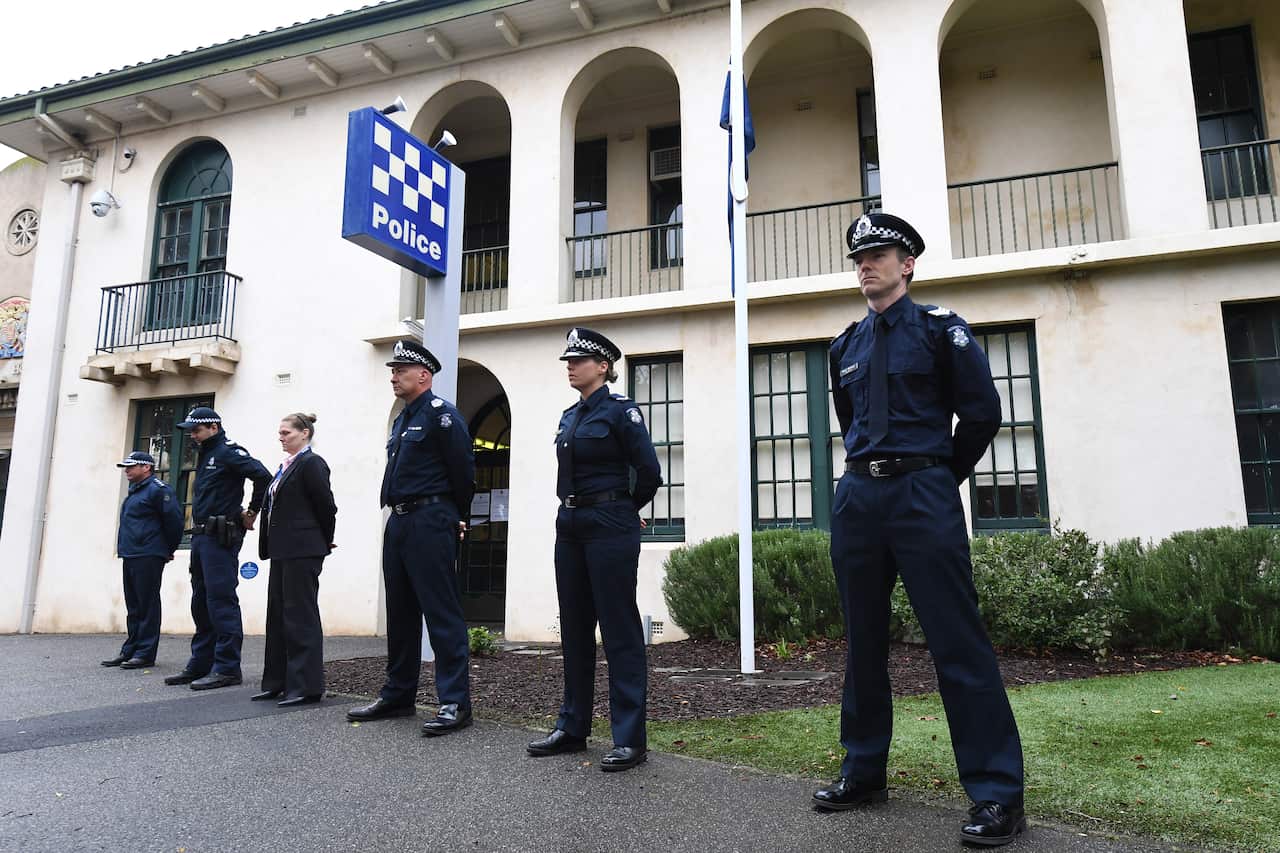 A guard of honour is formed by members of the South Melbourne Victoria Police Station in Melbourne.