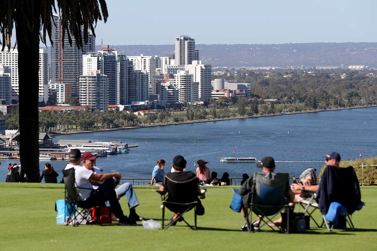 Members of the public gather in Kings Park in Perth on Friday.