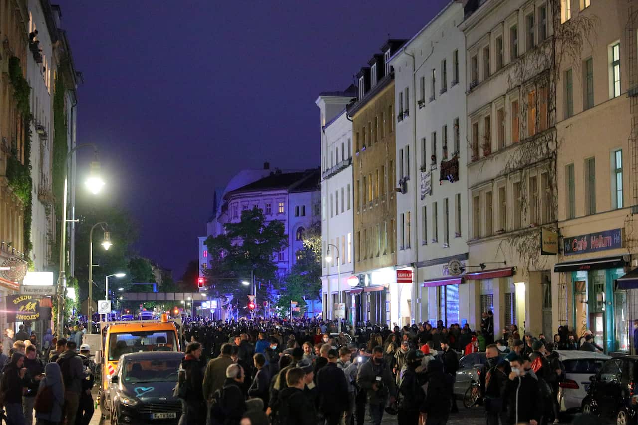 People gather during a protest on May Day in the district Kreuzberg in Berlin.