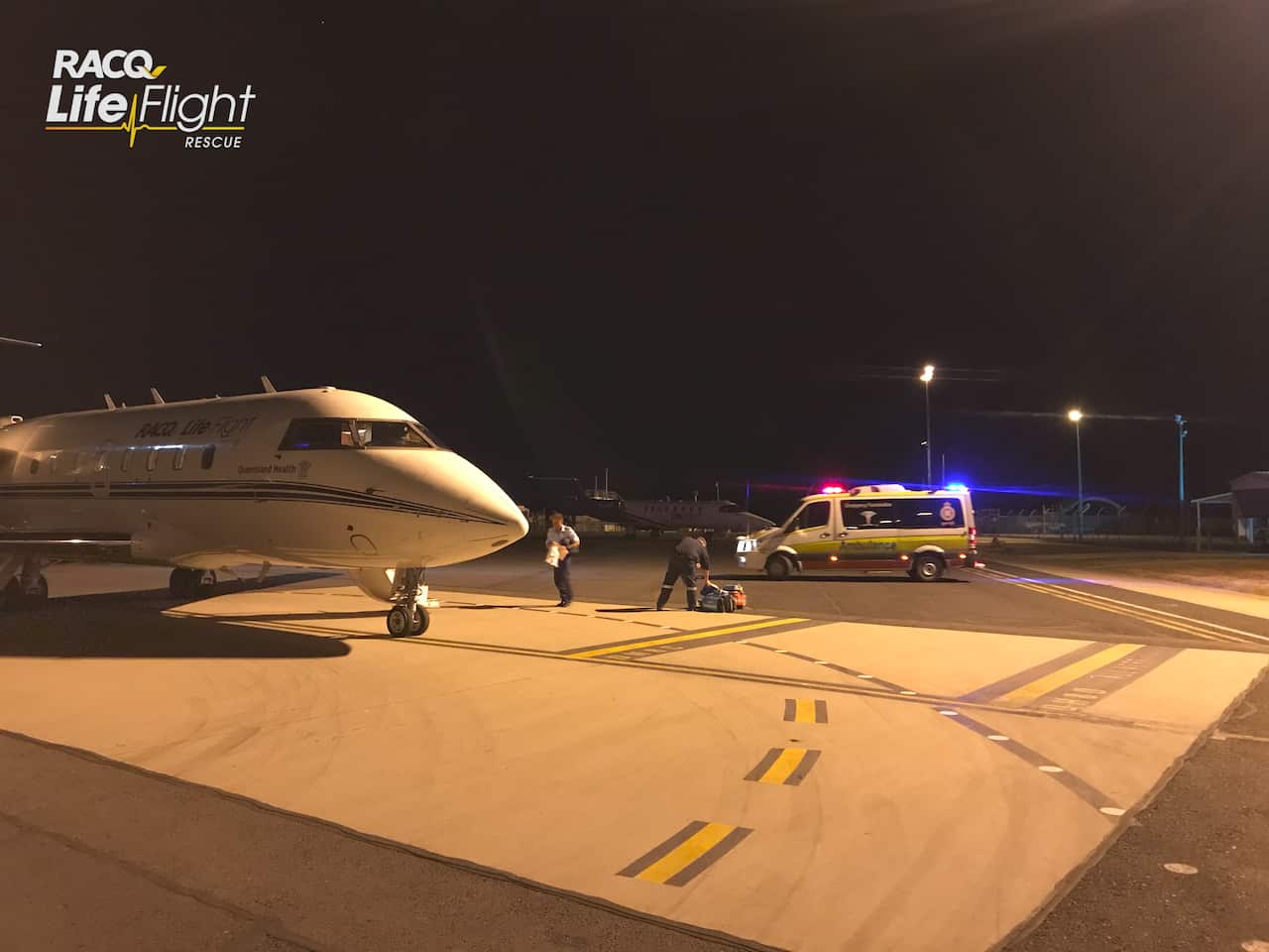 Patients from a mine explosion being transported by RACQ Lifeflight Rescue Air Ambulance jets at a Moranbah airport.