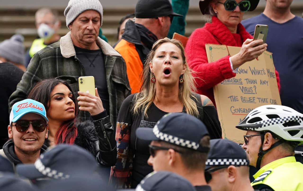 Anti-vaxxers and Victorians fed up with coronavirus restrictions protest outside Parliament House in Melbourne, Sunday, May 10, 2020. 