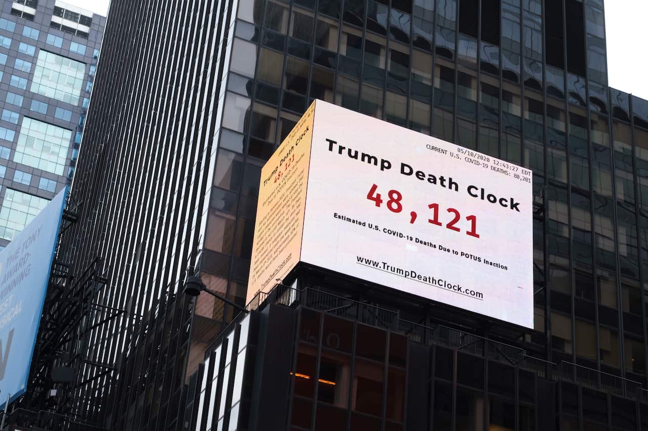 A billboard in Times Square shows the estimated number of people who have died of COVID-19 in the United States since the start of the coronavirus pandemic.