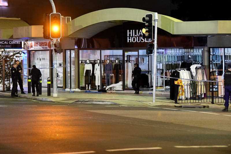 Police are seen after a car crashed into Hijab House in Greenacre, Thursday, May 21, 2020