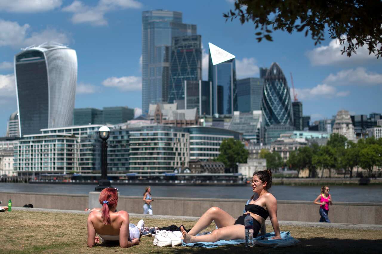People flock to London's parks with lockdown measures eased.
