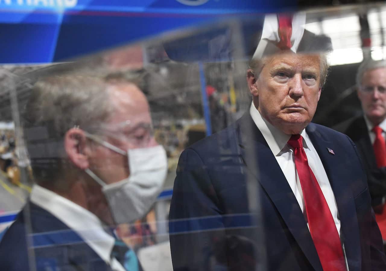 Executive Chairman of Ford Motor Company Bill Ford Jr, left, and President Donald Trump during a tour of Ford Motor plant in Michigan.