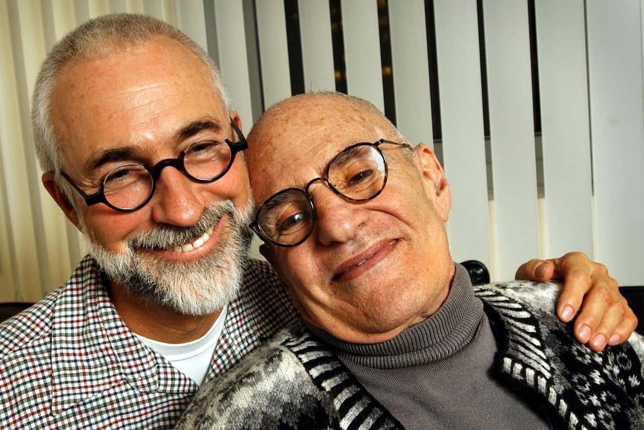 Writer and AIDS activist Larry Kramer, right, who is HIV positive, in his New York City apartment with partner David Webster. 