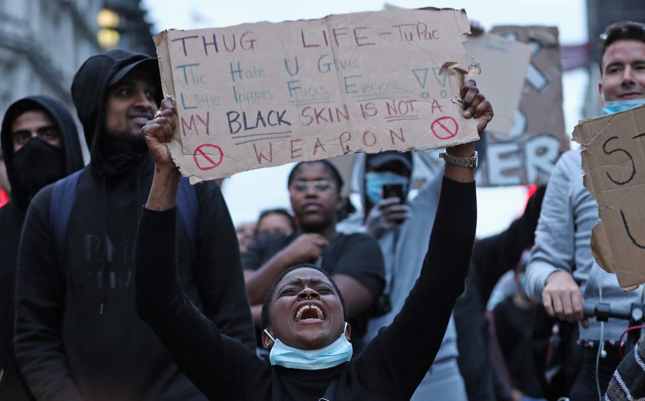 Protesters during a Black Lives Matter protest rally in London in memory of George Floyd who was killed in police custody in the US.