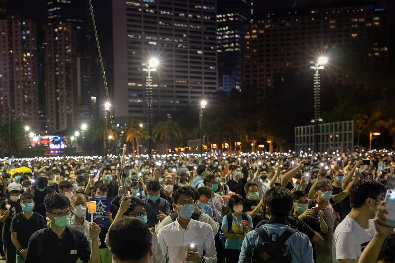Thousands of Hong Kong people defy a ban to commemorate the 31st Anniversary of the Tiananmen Square Massacre, in Hong Kong.