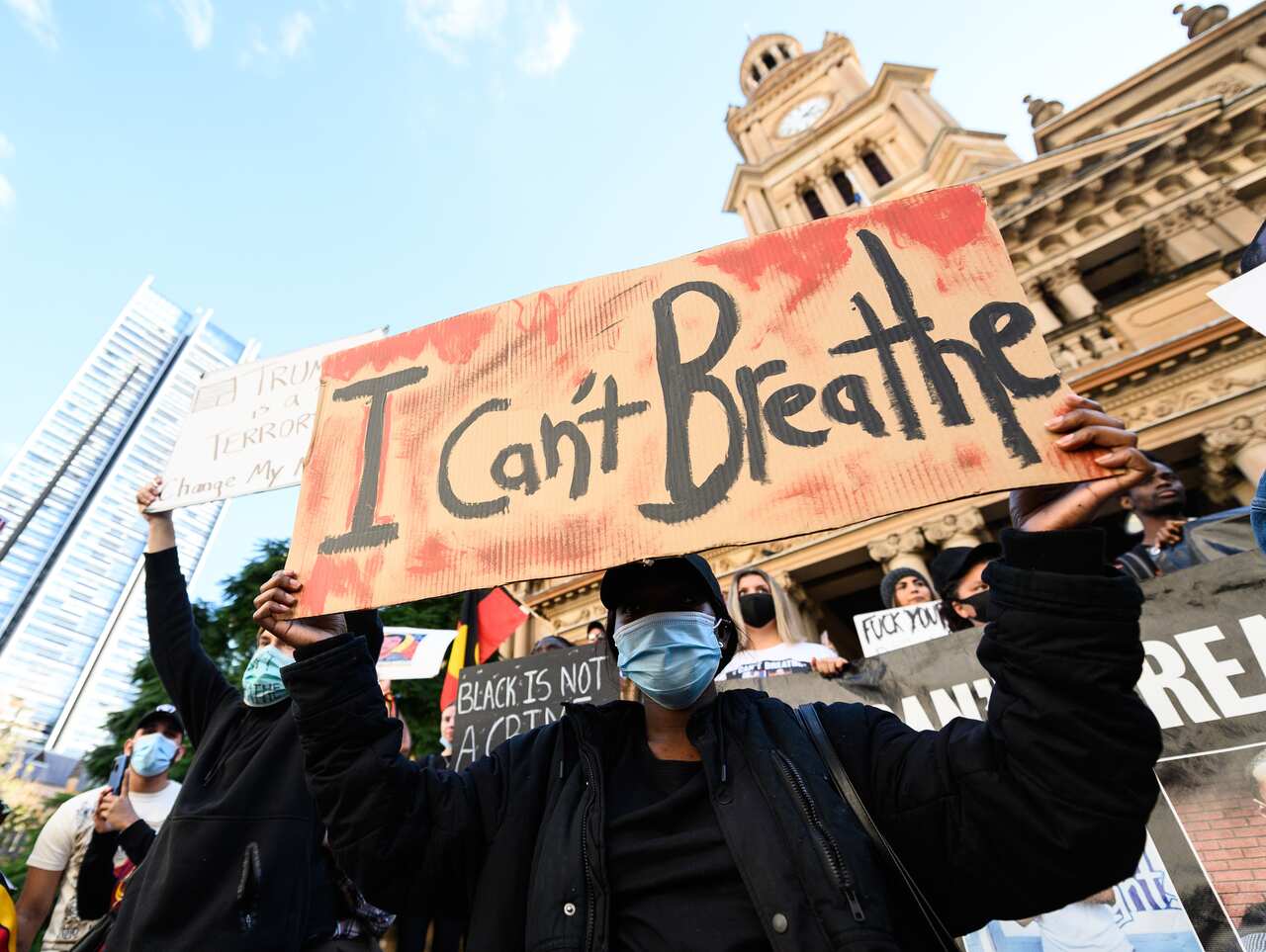 Protesters participate in a Black Lives Matter rally in Sydney in June last year. 